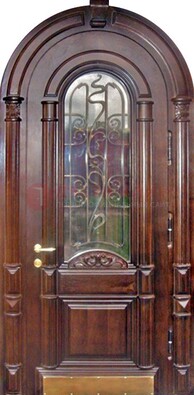 Арочная металлическая дверь массив со стеклом и ковкой ДА-50 в Долгопрудном