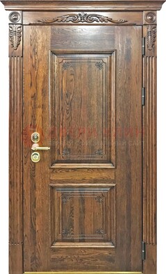 Коричневая металлическая дверь с массивом дуба и филенкой ДМД-67 в Казани