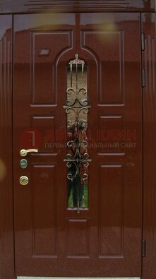 Красивая металлическая дверь со стеклом и ковкой ДСК-33 в Долгопрудном