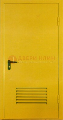 Желтая металлическая противопожарная дверь с вентиляционной решеткой ДТ-15 в Долгопрудном